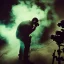 Placeholder: Monster photographer destroing camera in his studio. Smoke. green spot light. Particles in the air., post-apocalyptic, hyperdetailed, long shot, bokeh, studio lighting, low-key lighting, kodachrome