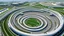 Placeholder: A white racetrack with boosting cars designed in ancient Roman mosaics painted by Cai Jia
