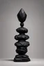 Placeholder: an ominous small statue made of black stone, incomprehensible shape