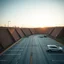 Placeholder: Highway rest area with steep walls and empty spacious parking spaces