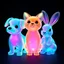 Placeholder: Three colored translucent 3D animals — a small dog, a cat, and a rabbit — standing together, each made of glowing glass-like material with vibrant iridescent gradients of cyan, magenta, amber, and violet glowing from within. Subsurface scattering, refractions, and caustics pass light through their transparent bodies, revealing soft inner structures. Cute proportions with rounded forms, floating in a dark void, volumetric lighting, octane render, hyperrealistic, ultra-detailed, 8k, trending on Ar