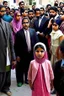 Placeholder: Opening shot: A noisy public place with a small and tense crowd gathered around Dr. Shumukh, a 10-year-old girl, a fierce and confident business leader Arabian style