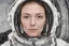 Placeholder: woman's face inside a long spacesuit