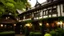 Placeholder: Situated at the heart of Lumin's Reach, the Quill & Scroll Inn beckons those with curious minds and a thirst for knowledge. The inn's timber-framed exterior, adorned with ivy and welcoming lanterns, blends seamlessly with the town's aesthetic, promising a cozy retreat for all who enter. The entrance is framed by climbing vines and lanterns that cast a warm, inviting glow. The wooden facade is weathered and charming, with a quaint sign swinging gently in the breeze, showcasing a quill and scroll.