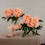 Placeholder: cinematic shot of peonies made from peach tulle in a glass bowl, warm lighting, soft lighting, sun light effects, linen, luxurious