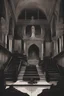 Placeholder: Toomb of the vampire Count Strahd Von Zarovich. Grand room, stone and marble, dark, black coffin made of polished ebony wood and brass. No windows. Strahd being pushed against his coffin