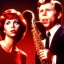 Placeholder: REd-haired Ron howard Is richie from happy days playing his saxophone with "closed-eyelids", rock band, embouchure, joanie cunningham