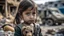 Placeholder: palestinian little girl looking at face to face her toy with tears and Destroyed buildings in the background