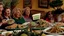 Placeholder: overeaters anonymous support group are interrupted by olive garden food advertisements