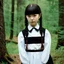Placeholder: Young devon aoki as Wednesday addams, braids, bangs, in tge woods