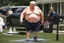 Placeholder: donald trump morbid obese and sweating without a shirt