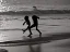 Placeholder: children playing on the Indian beach capture them against the sun and make an art silhouette, hyper details, real sharp, 8k, well detailed