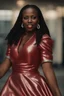 Placeholder: Portrait of a black woman wearing stylish red and silver dress.