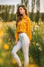 Placeholder: fullbody close up shot of young-beautiful-girl-with-a-perfect-face wearing pants and thight blouse and jacket sport shoes standing in country side green field flowers day lights