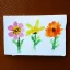 Placeholder: tiny watercolor of pressed flowers, etsy