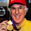 Placeholder: Larry David eats a gold medal at Denny's