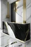 Placeholder: Black marble reception desk with white marble wall veined with gold