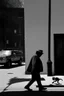 Placeholder: a man walks a sidewalk with a monster as his shadow