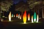 Placeholder: a garden with illuminated glass sculptures at night by sculptor "Lygia Pape",by artist "Lygia Clark"