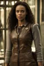 Placeholder: Maisie Richardson-Sellers as Matilda Harris, Doctor Who companion, sleeveless leather catsuit, stepping outside the TARDIS.