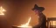 Placeholder: cowboy sitting on a chair lighting up a cigar