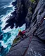 Placeholder: from the point of view of a rock climber, look down at the ocean rocks below as you climb high into the bluffs of ireland. holding on to the cliff face, the ocean below storms and swirls around a giant whirlpool, a great pit in the ocean