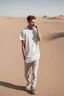 Placeholder: A 25-year-old boy in a men's sports t-shirt is walking in the desert, thinking with his head down and smoking a cigarette