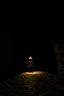 Placeholder: character in semi-darkness, on the scree cone of an underground room dimly lit by daylight coming from a well located forty meters above.