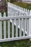 Placeholder: white vinyl fence in yard, photograph