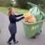 Placeholder: a lifelike picture of a women taking the rubbish out