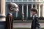 Placeholder: realistic young Harry Potter talking to Dobby in front of white house