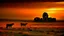 Placeholder: Karakul sheep grazing at dusk on endless meadows, their silhouettes outlined against the purple and orange sky, golden dust rising with their movements, mastiffs watching the flanks of the flock, ancient ruined hermitage as a silent witness, stars beginning to appear, pastoral impressionist style