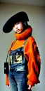 Placeholder: Young fleshy Japanese woman black hair. thick thigh, thick calves. Style: Haute Couture, 1990's, rough street style.Mantle is sewed of recycled Denim and sewed together of camouflage pieces.Big headphones, with gold rings, is merged with small felt cap with small visor. A bag is integrated to the mantle. Patterns are composed of orange, cream, blue, lilac and purple. blue latex somewhere. It is with big bright purple felt tippet and cream-colored-hood. mantle is merged with tippet.