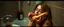 Placeholder: drunk woman with a hot dog in bread sleeping over in bathroom