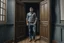 Placeholder: man in jeans and a shirt standing in a room of doors