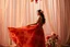Placeholder: picture of lady with a maxi dress flower stye design posing in a art an romantic stage