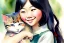 Placeholder: A cute smiling asian girl is holding a kitten. Watercolour