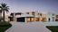 Placeholder: Description of a modern Emirati style villa: Located on a magnificent piece of land in the heart of the Emirates, our villa embodies the finesse of design and detailing that promises a luxurious residential experience. This two-story villa, with its elegant and contemporary spaces, stands out. The exterior walls of the villa are made of black and white stones, adding an elegant and luxurious touch to the design.Pictures of the villa from four sides