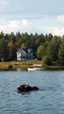Placeholder: A house by the lake , a boat in the lake , many trees in the background, a car is parked by the house, a beast in the lake.