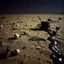 Placeholder: Photograph, odd objects scattered over an arid surface, night, nothingness, spooky, close-up, in Yves Tanguy style, nightmare, highly hypermaximalist, details of the terrain very accentuated, 8k, deep 3d field, sharp, eerily mysterious, artistic photo, large format film, shot on Hasselblad, 33mm photography, mysterious, dark, rotten, macabre, streams of black liquid