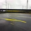 Placeholder: Minimal abstract oil paintings desolate 1960s carpark concrete fragments. Yellow road markings. style of Justin Mortimer and Francis Bacon.