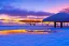 Placeholder: Honolulu Hawaii hotels covered in winter snow and ice at sunrise, winter wonderland