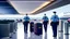 Placeholder: 2 security officers escort upset customer away from airport lounge