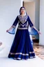 Placeholder: create a video of beautiful azerbaijani lady wearing traditional clothing dancing with sari gelin famous song and music of azerbaijan in a pretty villa garden