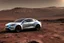Placeholder: A Tesla 'Model S' is parked, at the Cydonia region on Mars. (CINEMATIC, WIDE ANGLE LENS, PHOTO REAL)