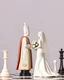 Placeholder: a chess bishop behind a wedding podium, with a chess king and queen getting married