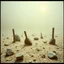 Placeholder: A striking quality close-up Kodak photograph captures a wasteland with odd stones, odd spindle-shaped objects, spooky, creepy, details of the dust very accentuated, glossy, organic, adorned with minerals and rocks, fog, feeble light, eerie, Yves Tanguy style, black sun, fog