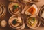 Placeholder: A selection of Dim Sum in bamboo steamer baskets, on a table in a posh restaurant using the Sony Alpha A7R IV, food photograpy style, macro lens, close up shot 50mm f/ 1, 4