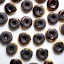 Placeholder: Donuts with black spinkles and white sprinkles