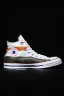 Placeholder: A converse sneaker with India's flag printed on the material